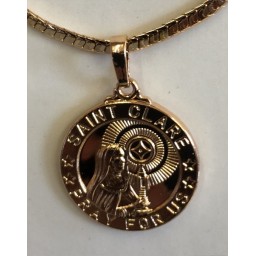 St Clare Round Medallion prayer on reverse side Gold plated St Clare Round Medallion prayer on reverse side Gold plated